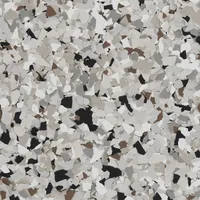 Coyote flake sample with white, light tan, gray, black and a few brown chips